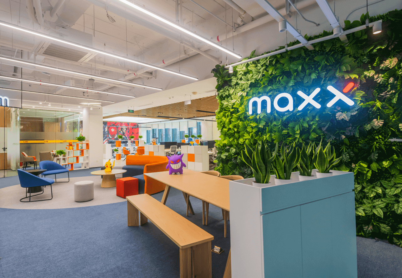 MAXX office green wall and shared table